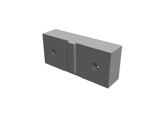 3D render of the vertical-slotted compact block showing face mounting points.