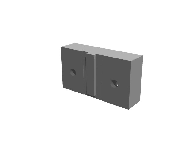 3D render of a compact rectangular block showing a vertical slot and front counterbores.