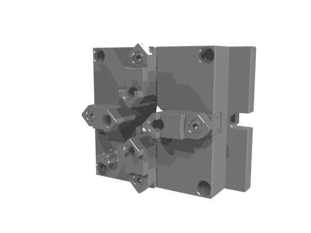 A heavy-duty, square-shaped gray industrial clamping fixture or tombstone block.