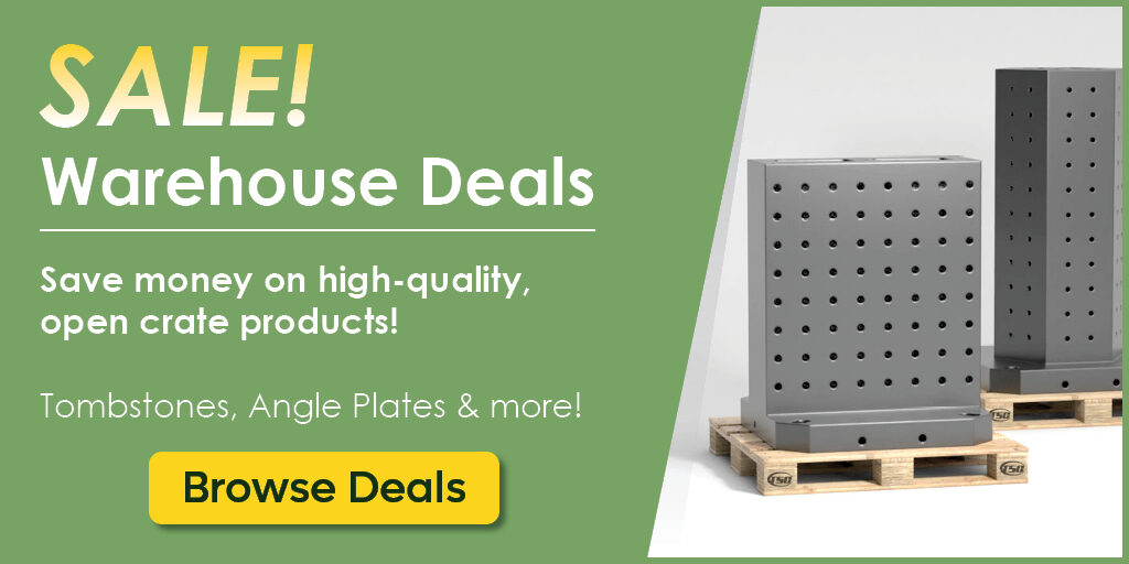 Promotional banner advertising a 'Warehouse Deals' sale on industrial equipment. Text offers savings on open-crate tombstones and angle plates, with a yellow 'Browse Deals' call-to-action button. The graphic shows a grey metal angle plate and a tombstone fixture resting on mini wooden pallets.